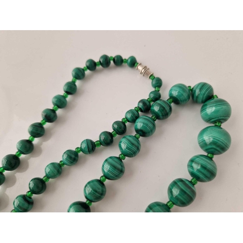 310 - A green malachite stone necklace with silver clasp 22 inch