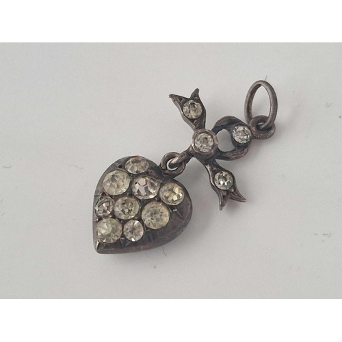 313 - A silver paste heart pendant and hard stone cameo