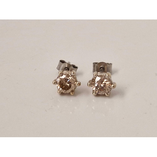 344 - A PAIR OF 18CT WHITE GOLD AND PLATINUM DIAMOND STUDS 1.10 TOTAL CARAT DIAMOND WEIGHT