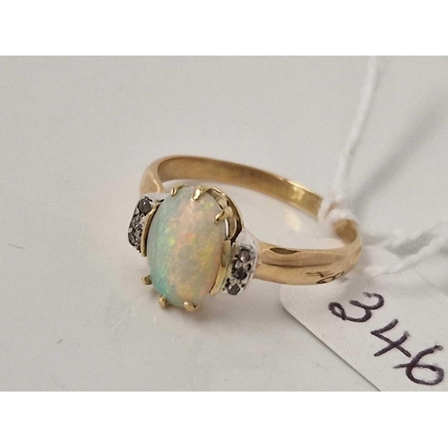 346 - A single stone opal ring with diamond set shoulders 18ct gold size O 3.2 gms