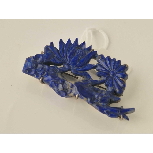 353 - A silver and carved lapis floral brooch