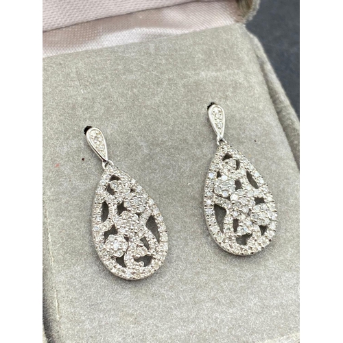 362 - A pair of white gold diamond drop earrings approx 0.33 carats