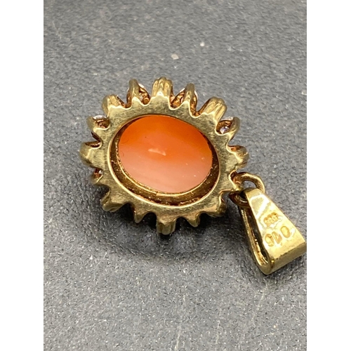 368 - A antique coral and diamond pendant in 14CT GOLD