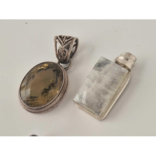 376 - Three large silver stone set pendants