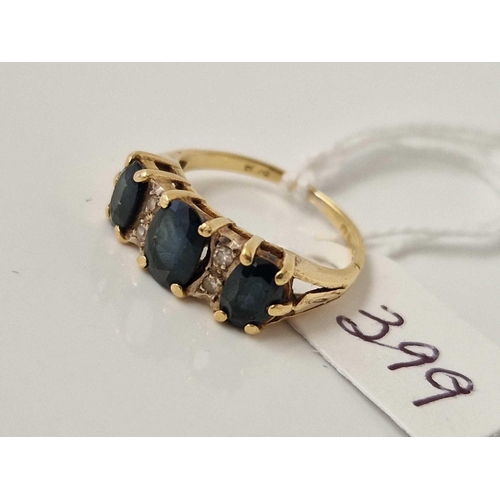 399 - A seven stone sapphire and diamond ring 18ct gold size K 3.4 gms