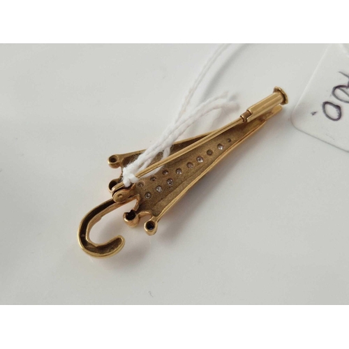 400 - A DIAMOND SET UMBRELLA SHAPED BROOCH 18CT GOLD 5.4 GMS