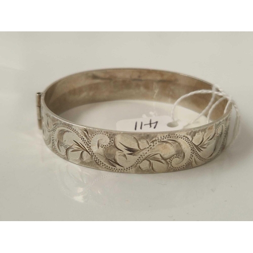 411 - A large hallmarked silver bangle 30 gms