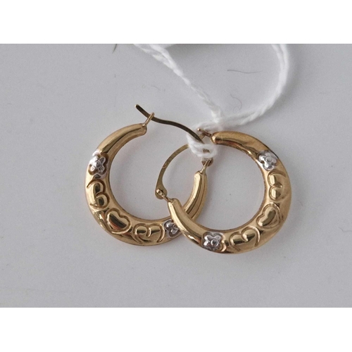 427 - A pair of hoop earrings 9ct