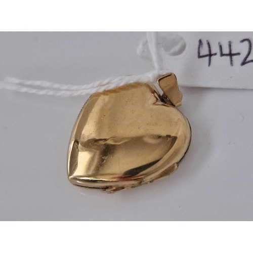 442 - A antique rolled gold heart shaped locket