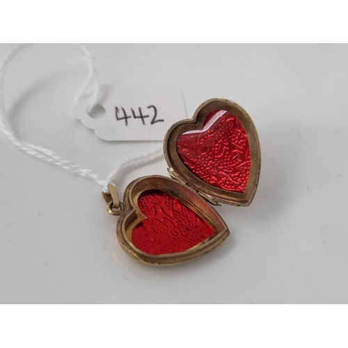 442 - A antique rolled gold heart shaped locket