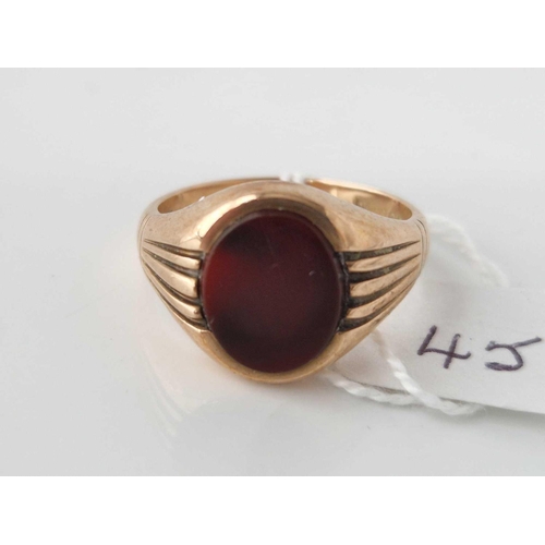 45 - A SIGNET RING SET WITH A CARNELIAN 9CT LONDON 1963 SIZE X 10.2 GMS