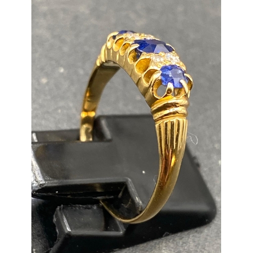 465 - A VICTORIAN SEVEN STONE SAPPHIRE AND DIAMOND RING 18CT GOLD SIZE O