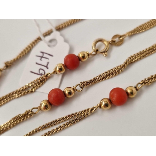 479 - A CORAL BEAD NECKLACE 9CT 23 INCH 10.1 GMS