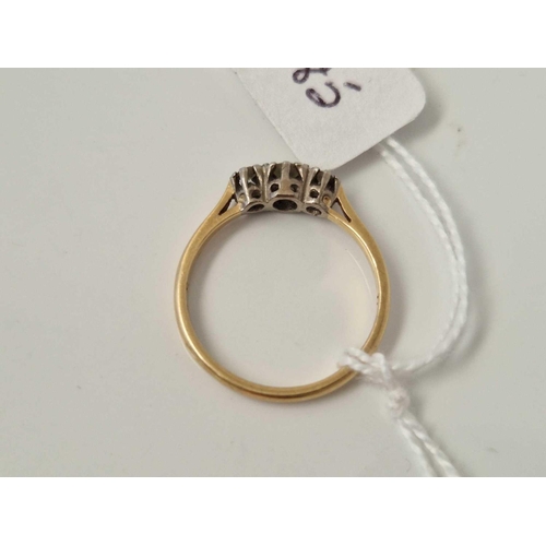 485 - A three stone diamond ring 18ct gold size N 2.4 gms