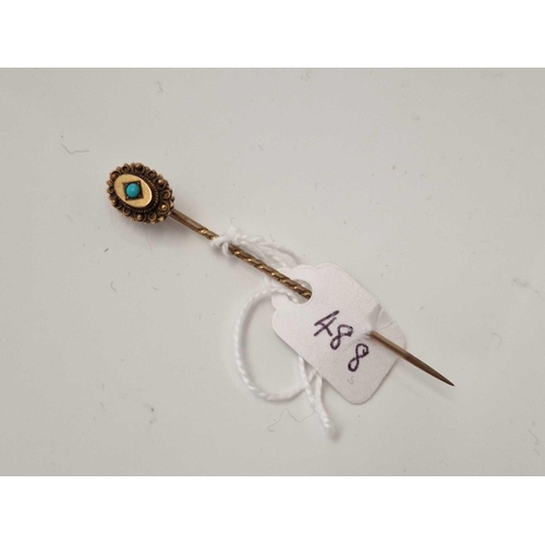 488 - A turquoise and gold fancy stick pin 15ct gold 1.6 gms