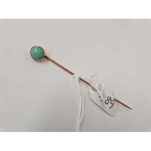 489 - A gold turquoise top stick pin 1.7 gms