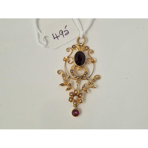 495 - A pearl and garnet pendant 9ct 3.1 gms