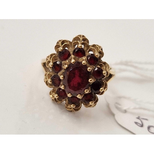 509 - A garnet cluster ring 9ct size N 5 gms