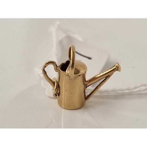 527 - A watering can charm 9ct 1.7 gms