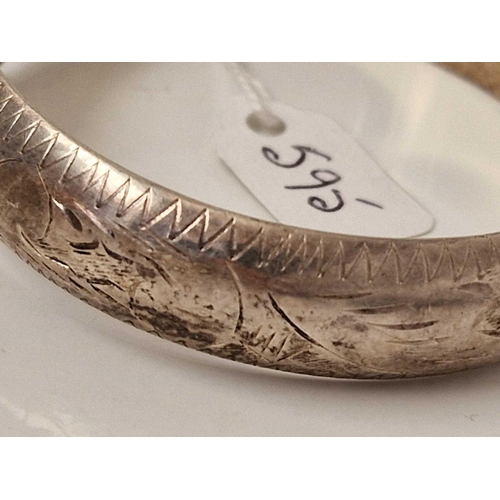 595 - A silver hinged bangle 20 gms