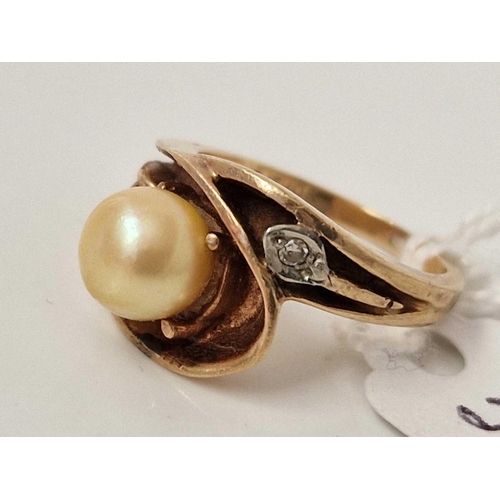 597 - A pearl and diamond ring 10ct gold size K 5 gms