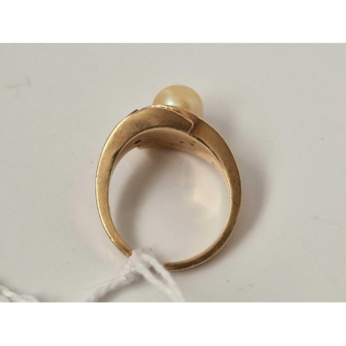 597 - A pearl and diamond ring 10ct gold size K 5 gms