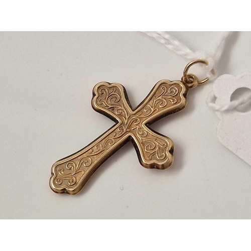 611 - A 9ct cross