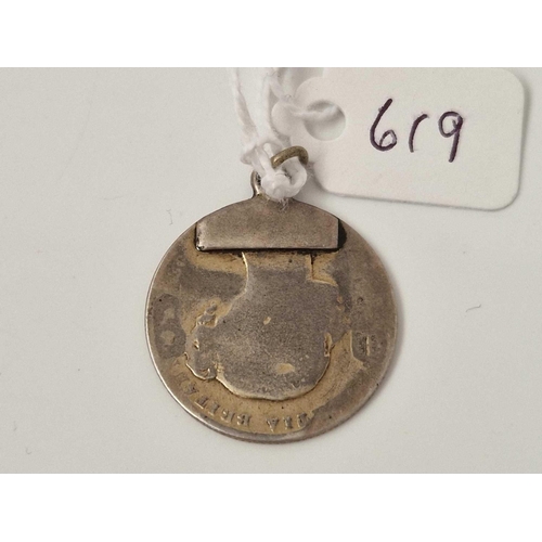 619 - A silver and enamel one shilling pendant