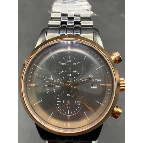 671 - A good CONSTANTIN WEISZ automatic multi dial gents watch with seconds sweep and date aperture