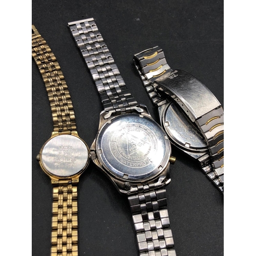 713 - Two gents and ladies SEIKO and a GUESS wrist watch