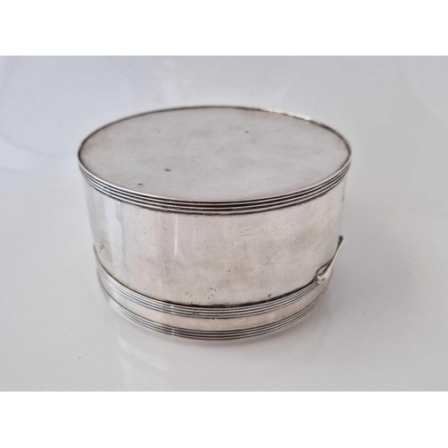 824 - A circular Dutch box with reeded bands, 5 inches diameter, 303 g.