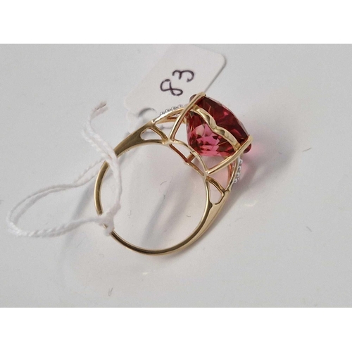 83 - A dress ring with red heart stone 10ct gold size Q