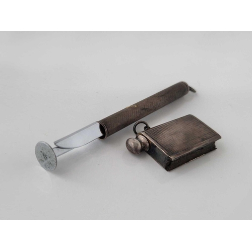 836 - A pipe tamper and a lighter