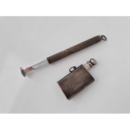 836 - A pipe tamper and a lighter