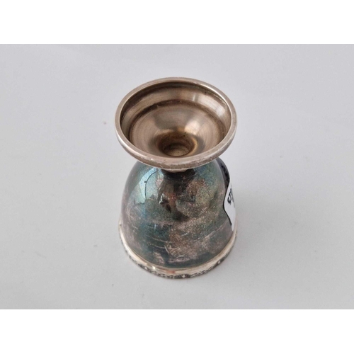 858 - An egg cup with celtic style rim, 2.5 inches high, Birmingham 1965, 40 g.