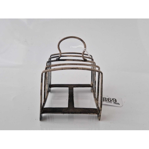 869 - An oblong toast rack on bracket feet, 3