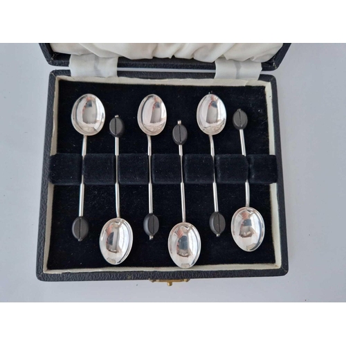 925 - A cased set of six bean top coffee spoons, Birmingham 1925