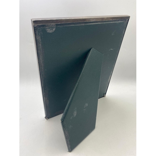 971 - A plain oblong photo frame easel back, 11 inches high, London 1966, 135g weighable silver