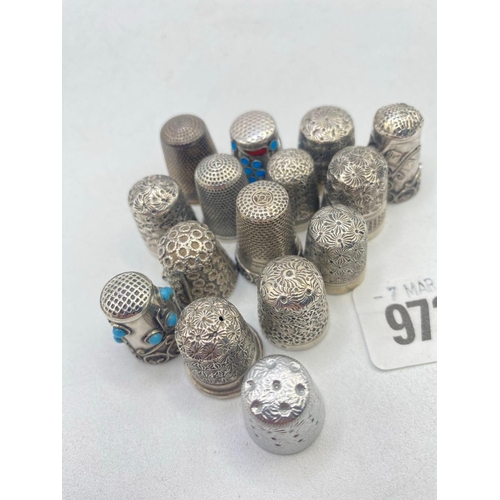 972 - A group of 15 various silver thimbles