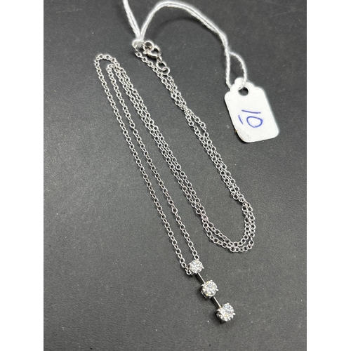 10 - A THREE STONE DIAMOND PENDANT 18CT GOLD 0.75 CARATS 4.2 GMS