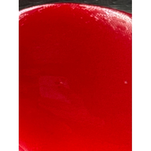 12 - A string of cherry amber beads 61.3 gms