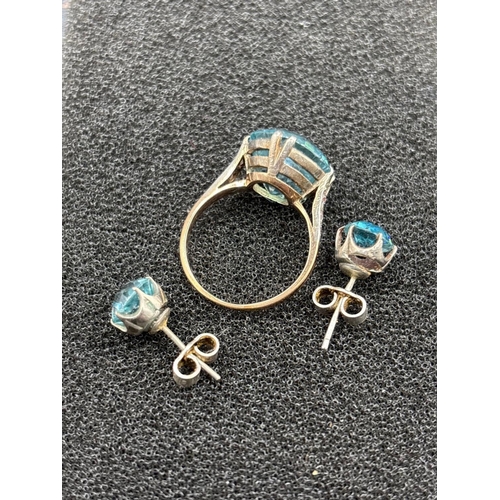 20 - A GOOD BLUE ZIRCON AND DIAMOND RING AND MATCHING EARRINGS