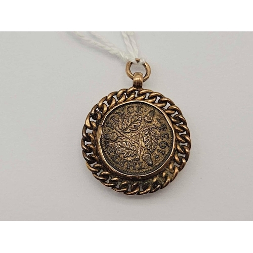 31 - A compass fob with coin inset 9ct 8.1 gms inc.