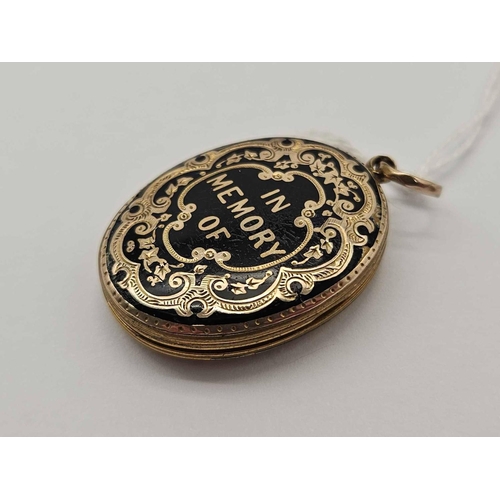 35 - A back and front black enamel mourning locket 9ct 6.9 gms
