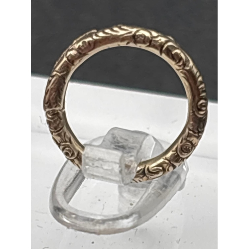 57 - A Victorian gold embossed split ring