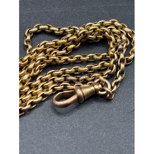 58 - A VICTORIAN LONG GUARD CHAIN 9CT 55 INCH 27.2 GMS