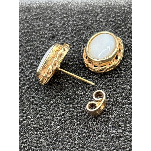 110 - Cabochon opal ear-rings 9ct 2.1g