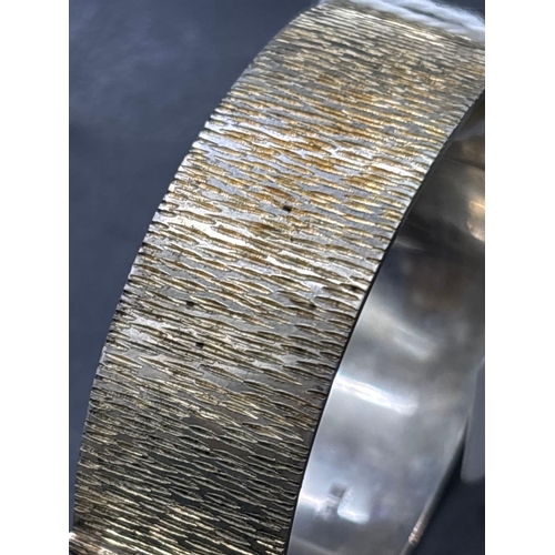 111 - A good silver bark effect bangle