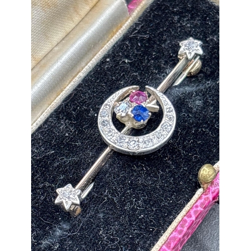 22 - Antique Edwardian diamond set crescent brooch with sapphire and ruby highlights in original box by B... 