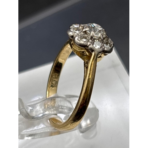 28 - Antique daisy diamond cluster ring in 18ct gold, size I